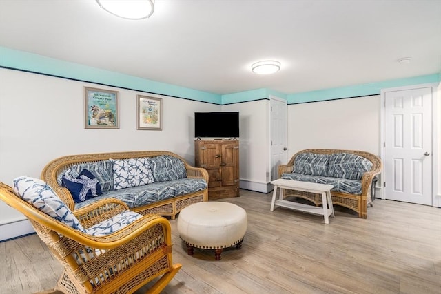 living area featuring wood finished floors