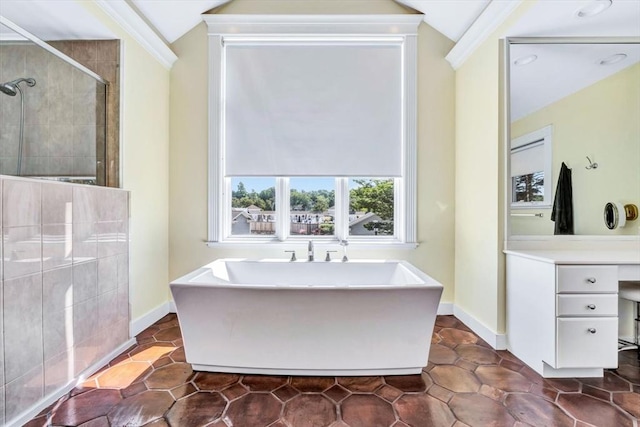 bathroom with shower with separate bathtub, tile patterned flooring, and vaulted ceiling