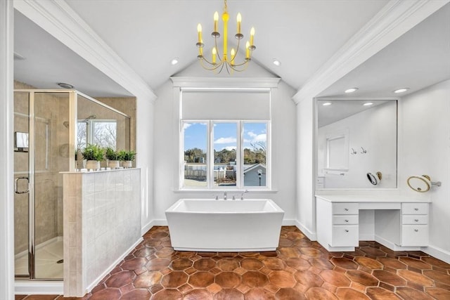 bathroom with a notable chandelier, vaulted ceiling, and plus walk in shower