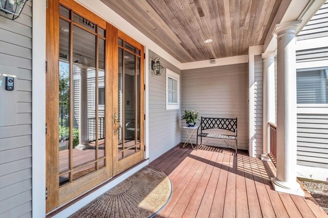 wooden terrace featuring french doors