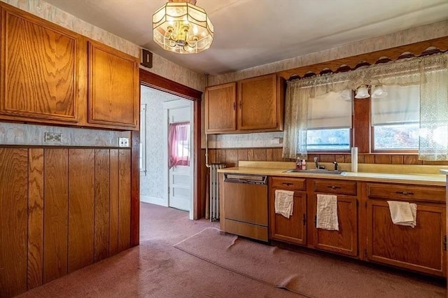 2 Leicester St, Oxford, MA 01537 - kitchen featuring carpet floors, brown cabinets, a sink, dishwasher, and a notable chandelier