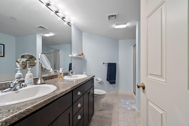 4 Sterling Hill Ln Unit 424, Exeter, NH 03833 - bathroom with a stall shower, double vanity, and tile patterned floors