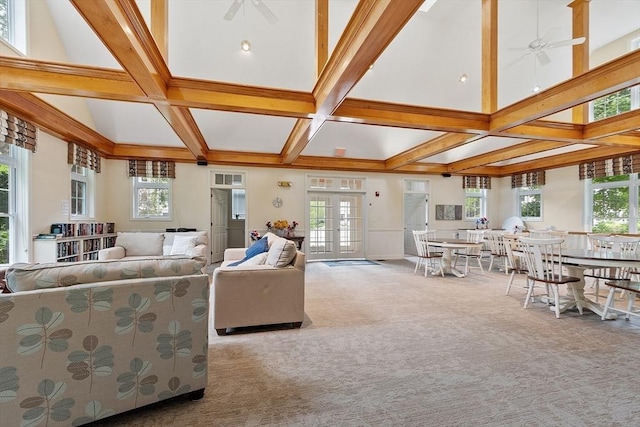4 Sterling Hill Ln Unit 424, Exeter, NH 03833 - living room with ceiling fan, beamed ceiling, carpet, coffered ceiling, and french doors