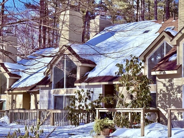 chalet / cabin with a chimney