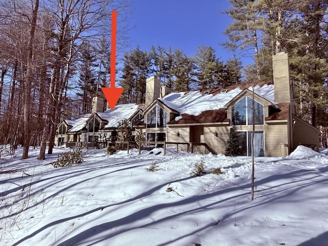 view of front of home with a chimney