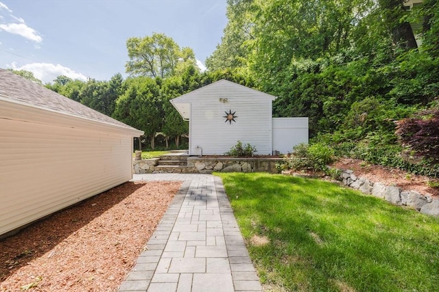 35 Williams St, Lincoln, RI 02865 - view of green lawn with an outbuilding