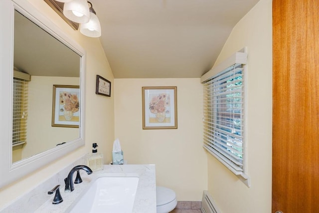 35 Williams St, Lincoln, RI 02865 - bathroom with toilet, vanity, vaulted ceiling, and tile patterned floors