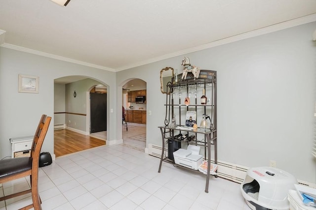 35 Williams St, Lincoln, RI 02865 - spare room with arched walkways, a baseboard radiator, ornamental molding, and a baseboard heating unit
