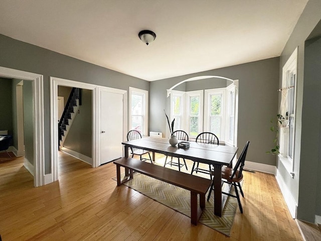 36 Circle St, Templeton, MA 01436 - dining space featuring light wood-type flooring, baseboards, and stairway