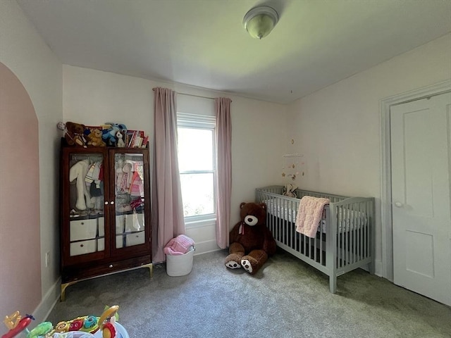 36 Circle St, Templeton, MA 01436 - carpeted bedroom featuring arched walkways and a nursery area