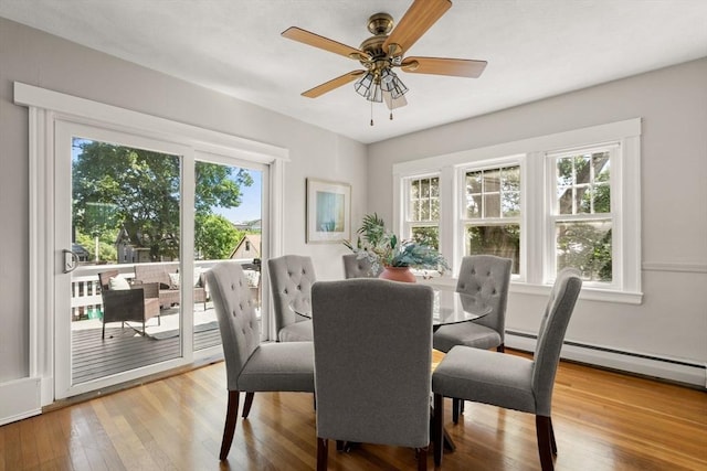 15 Newland Rd, Arlington, MA 02474 - dining space with baseboard heating, light wood-style flooring, and a ceiling fan