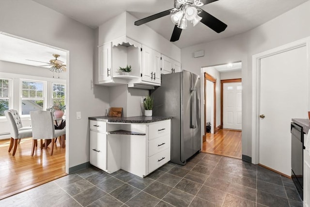 15 Newland Rd, Arlington, MA 02474 - kitchen with a ceiling fan, freestanding refrigerator, dishwasher, dark countertops, and white cabinetry