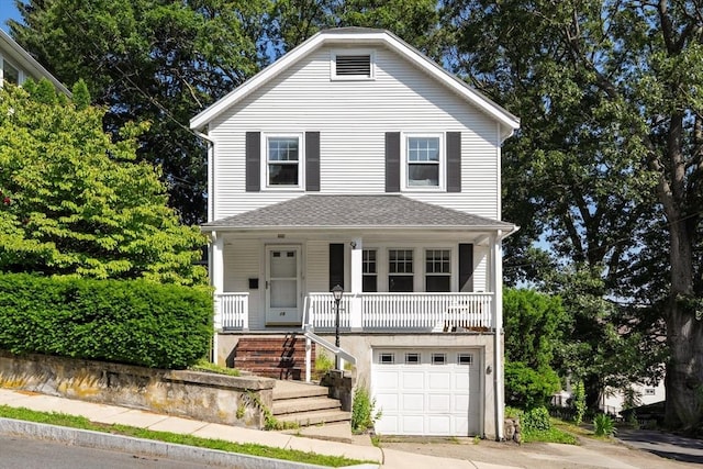 15 Newland Rd, Arlington, MA 02474 - view of front of house featuring a porch, an attached garage, stairs, concrete driveway, and a shingled roof