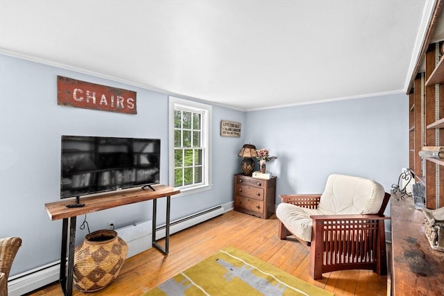 146 Chief Justic Cushing Hwy, Scituate, MA 02066 - sitting room featuring baseboard heating, ornamental molding, and hardwood / wood-style flooring