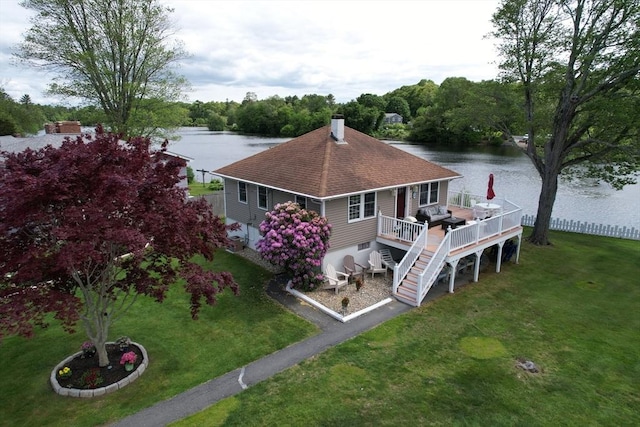 72 Lakeview Pl, Taunton, MA 02780 - rear view of house with a deck with water view, a yard, a chimney, stairway, and a shingled roof
