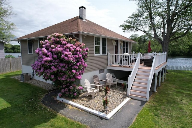 72 Lakeview Pl, Taunton, MA 02780 - rear view of property with a wooden deck, stairs, a chimney, and roof with shingles