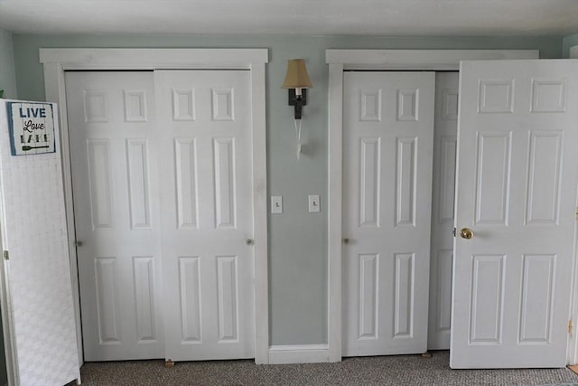 72 Lakeview Pl, Taunton, MA 02780 - unfurnished bedroom featuring dark carpet and baseboards