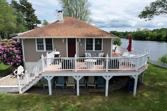 72 Lakeview Pl, Taunton, MA 02780 - rear view of house with a chimney, a deck with water view, a shingled roof, and stairway