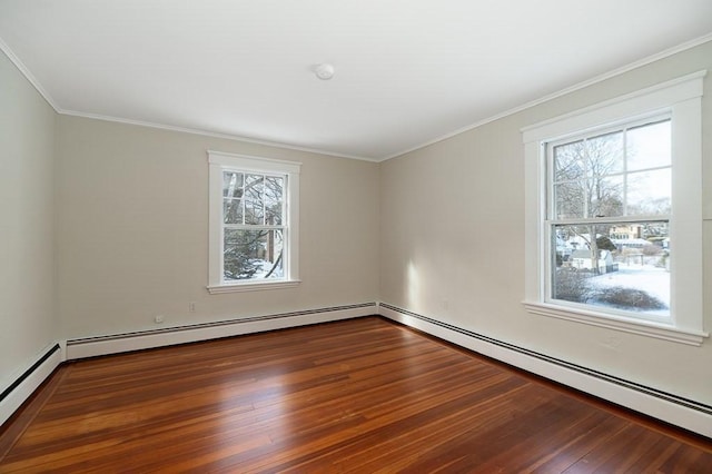 spare room featuring crown molding, a wealth of natural light, and wood-type flooring