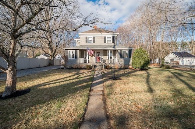 view of front of property with a front lawn and a porch