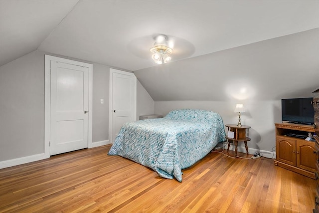 72 Lyall St, Boston, MA 02132 - bedroom with light wood finished floors, vaulted ceiling, and ceiling fan