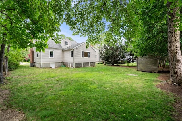 72 Lyall St, Boston, MA 02132 - view of green lawn featuring a shed