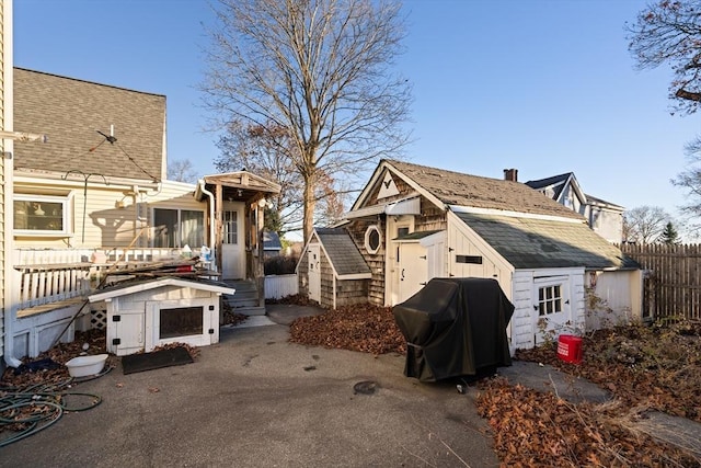 exterior space featuring a storage shed