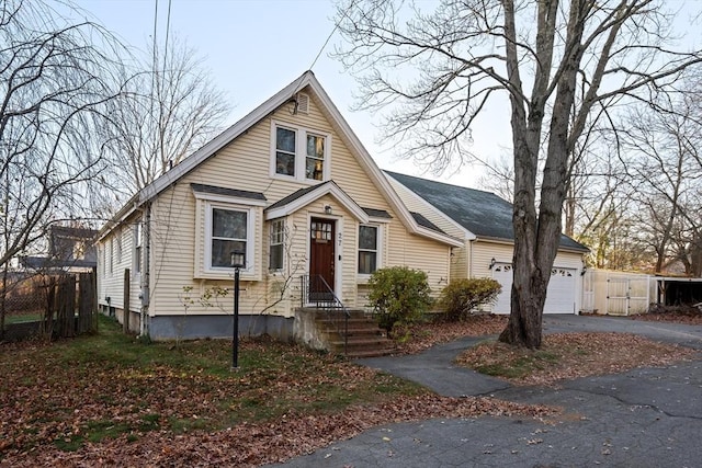 bungalow-style home featuring a garage