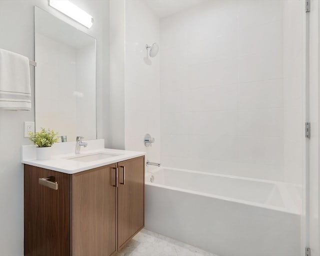 bathroom featuring vanity and shower / bathing tub combination