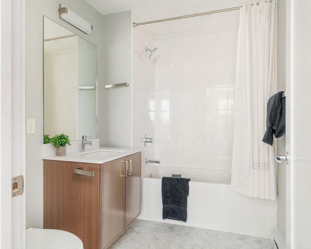 full bathroom featuring vanity, toilet, and shower / bath combo with shower curtain