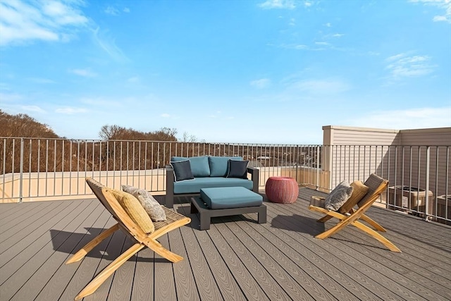 wooden terrace with central air condition unit and an outdoor hangout area