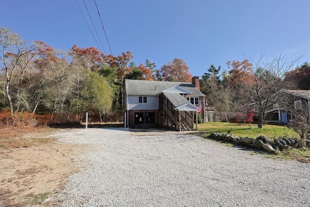 view of front of property with a carport