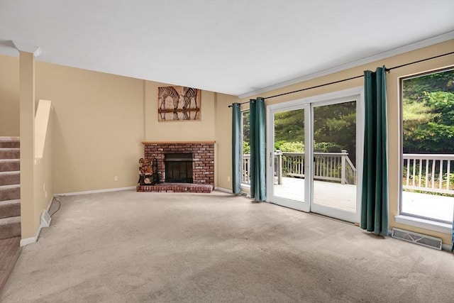 43 Meadowbrook Ln Unit 43, Palmer, MA 01069 - unfurnished living room with carpet floors, stairway, and a fireplace