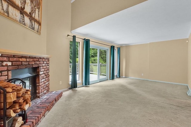 43 Meadowbrook Ln Unit 43, Palmer, MA 01069 - unfurnished living room featuring carpet, a brick fireplace, and ornamental molding