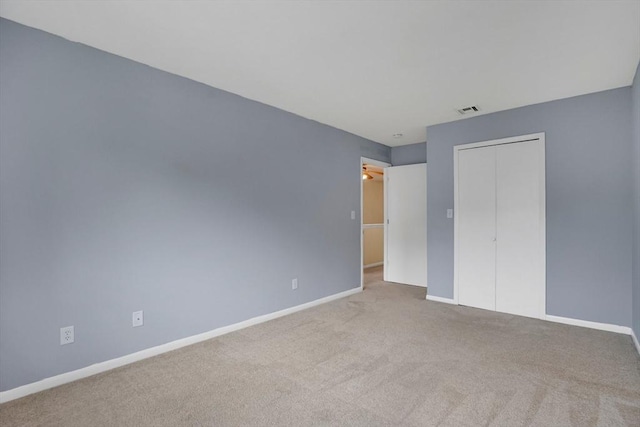 43 Meadowbrook Ln Unit 43, Palmer, MA 01069 - unfurnished bedroom featuring carpet flooring and a closet