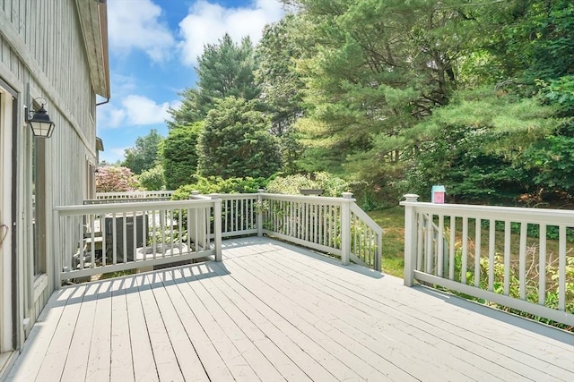 43 Meadowbrook Ln Unit 43, Palmer, MA 01069 - wooden deck with view of wooded area