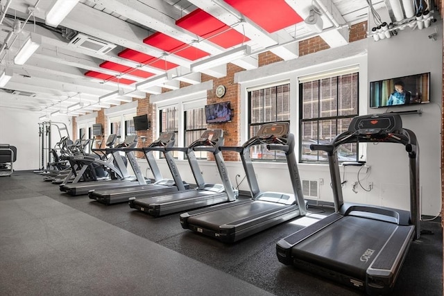 gym with a healthy amount of sunlight