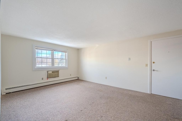 carpeted empty room with a baseboard radiator and a wall mounted air conditioner