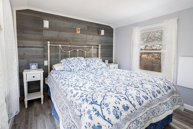 1 Ladd Ave, Wareham, MA 02571 - bedroom with wooden walls, wood finished floors, an accent wall, and baseboards
