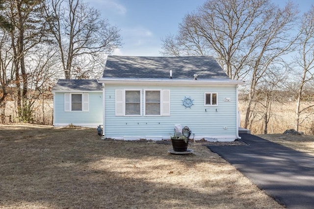 1 Ladd Ave, Wareham, MA 02571 - rear view of house featuring roof with shingles and driveway