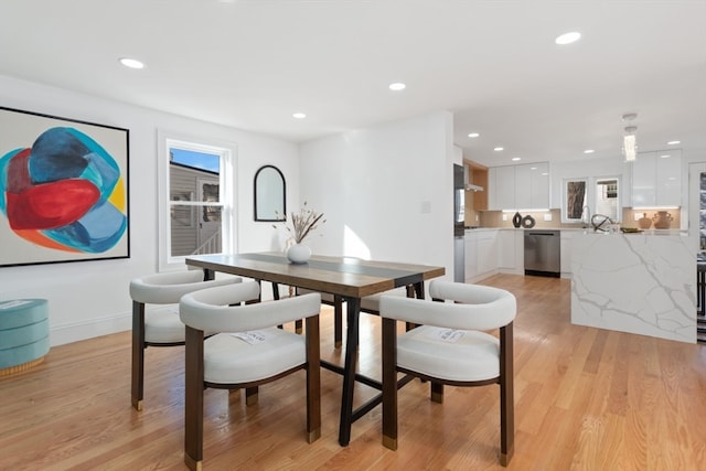 dining area featuring light hardwood / wood-style floors