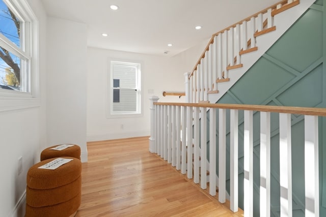 staircase featuring hardwood / wood-style flooring