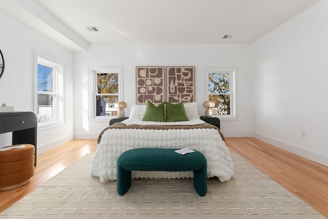 bedroom with light hardwood / wood-style floors