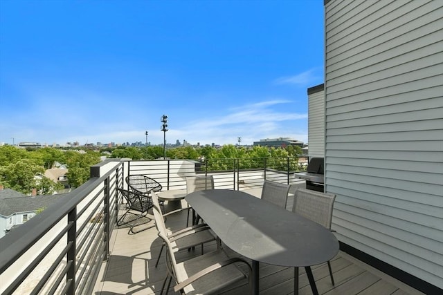 50 Leo M Birmingham Pkwy Unit 405, Boston, MA 02135 - balcony with outdoor dining area
