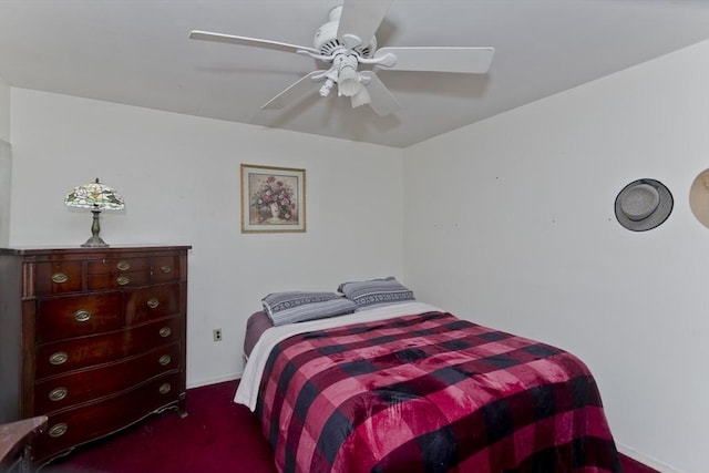 carpeted bedroom with a ceiling fan