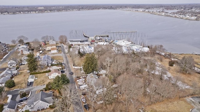 bird's eye view with a residential view and a water view