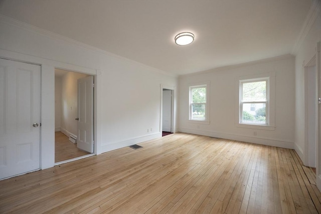 27 Union St Unit 27, Natick, MA 01760 - empty room with light wood-style flooring and ornamental molding