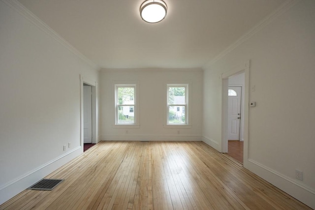 27 Union St Unit 27, Natick, MA 01760 - empty room with light wood finished floors and ornamental molding