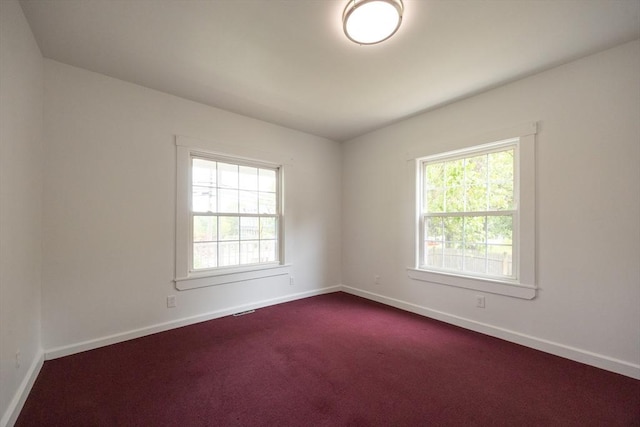 27 Union St Unit 27, Natick, MA 01760 - unfurnished room with baseboards and dark colored carpet