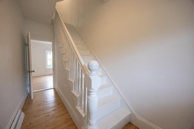 27 Union St Unit 27, Natick, MA 01760 - stairs with hardwood / wood-style flooring and a baseboard heating unit